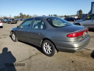 ✅ 1998 Ford Contour LX • VIN: 1FAFP66L5WK236964 • Лот: 46866675. Опубликован ранее на Copart с пробегом 91 107 миль. Бесплатный доступ к архиву аукционных продаж из США и подробный отчёт об истории автомобиля на DreamBid. Изображение 2.
