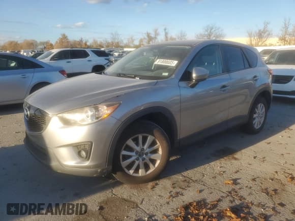 ✅ 2014 Mazda CX-5 Touring • VIN: JM3KE4CY9E0313601 • Lot: 91800085. Wystawiony na Copart z przebiegiem 170 490 mil. Bezpłatny archiwum sprzedaży aukcyjnych z USA i szczegółowy raport historii pojazdu na DreamBid. Zdjęcie 1.