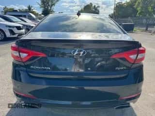 2016 Hyundai Sonata Sport с VIN 5NPE34AF9GH325654, выставлен на аукционе Copart как лот 90275685 с пробегом 76 792 миль миль и Списание • Salvage title. История ставок и продаж доступна на DreamBid. Изображение 6.