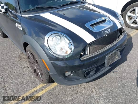 2013 MINI Hardtop S with VIN WMWSV3C53DT477574, listed as a IAAI auction lot 42385383 with 81,312 mi miles and . Bid and sale history available at DreamBid. Image 14.