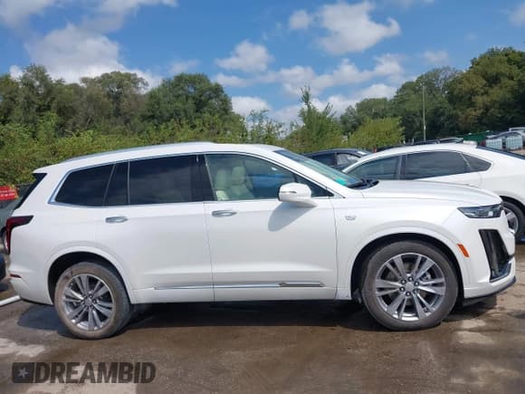 ✅ 2023 Cadillac XT6 AWD Premium Luxury • VIN: 1GYKPDRS2PZ142995 • Lot: 43181806. Wystawiony na IAAI z przebiegiem 45 774 mil. Bezpłatny archiwum sprzedaży aukcyjnych z USA i szczegółowy raport historii pojazdu na DreamBid. Zdjęcie 14.