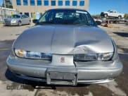 ✅ 1999 Saturn SL • VIN: 1G8ZK5270XZ150067 • Lot: 86307625. Wystawiony na Copart z przebiegiem 182 675 mil. Bezpłatny archiwum sprzedaży aukcyjnych z USA i szczegółowy raport historii pojazdu na DreamBid. Zdjęcie 5.