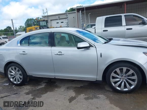 ✅ 2014 Lincoln MKS • VIN: 1LNHL9DK7EG609638 • Lot: 42522461. Wystawiony na IAAI z przebiegiem 48 785 mil. Bezpłatny archiwum sprzedaży aukcyjnych z USA i szczegółowy raport historii pojazdu na DreamBid. Zdjęcie 13.