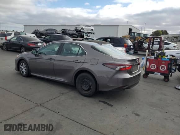2022 Toyota Camry Hybrid LE с VIN 4T1C31AK7NU587920, выставлен на аукционе Copart как лот 71995655 с пробегом 42 628 миль миль и Списание • Salvage title. История ставок и продаж доступна на DreamBid. Изображение 2.