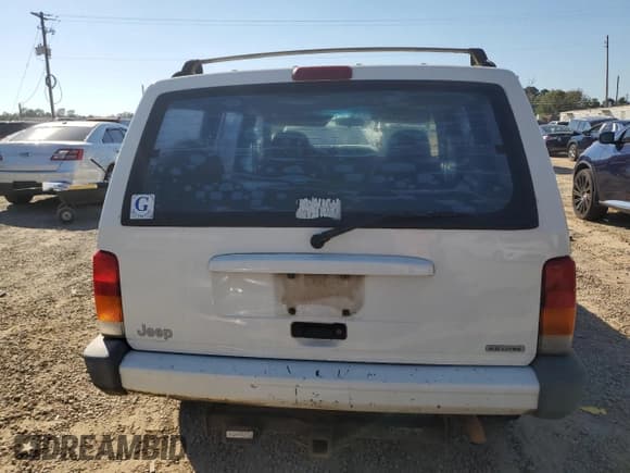 ✅ 2001 Jeep Cherokee Sport • VIN: 1J4FT48S61L576779 • Lot: 86999455. Listed on Copart with 245,218 mi. Free auction sales archive from the USA and detailed vehicle history report at DreamBid. Image 6.