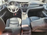 ✅ 2023 Cadillac XT5 AWD Premium Luxury • VIN: 1GYKNDRS8PZ107285 • Лот: 70170475. Опубликован ранее на Copart с пробегом 47 029 миль. Бесплатный доступ к архиву аукционных продаж из США и подробный отчёт об истории автомобиля на DreamBid. Изображение 8.