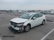 ✅ 2017 Subaru Impreza Premium • VIN: 4S3GKAB63H3618634 • Lot: 42863148. Listed on IAAI with 91,289 mi. Free auction sales archive from the USA and detailed vehicle history report at DreamBid. Image 2.