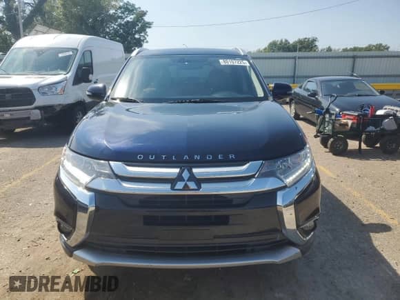 2018 Mitsubishi Outlander SE with VIN JA4AD3A34JJ001614, listed as a Copart auction lot 80107225 with 100,279 mi miles and Salvage title. Bid and sale history available at DreamBid. Image 5.