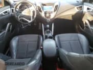 ✅ 2014 Hyundai Veloster • VIN: KMHTC6AD0EU194971 • Lot: 80247394. Wystawiony na Copart z przebiegiem 151 663 mil. Bezpłatny archiwum sprzedaży aukcyjnych z USA i szczegółowy raport historii pojazdu na DreamBid. Zdjęcie 8.