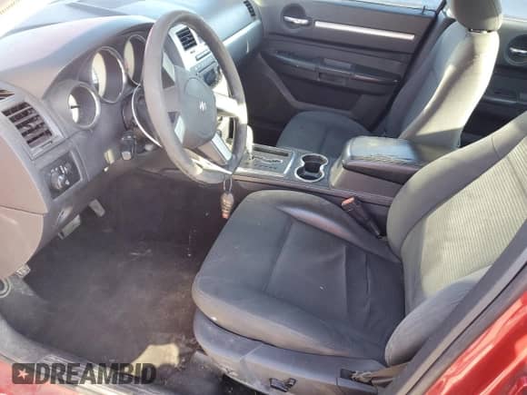 2010 Dodge Charger SXT with VIN 2B3CA3CV5AH178682, listed as a Copart auction lot 77254233 with 230,364 mi miles and Salvage title. Bid and sale history available at DreamBid. Image 7.