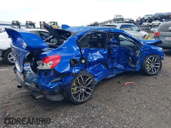 ✅ 2020 Subaru WRX STI • VIN: JF1VA2E67L9831559 • Lot: 42574564. Listed on IAAI with 67,333 mi. Free auction sales archive from the USA and detailed vehicle history report at DreamBid. Image 4.