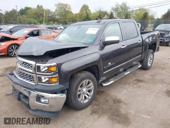 2015 Chevrolet Silverado 1500 LT z VIN 3GCUKREC9FG412201, wystawiony jako IAAI lot #43291126 z przebiegiem 141 513 mil mil oraz . Historia ofert i sprzedaży dostępna na DreamBid. Obrazek 2.