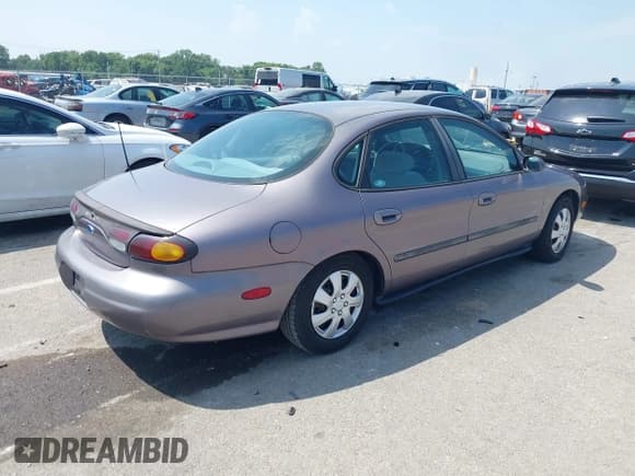 ✅ 1996 Ford Taurus GL • VIN: 1FALP52U5TA268651 • Lot: 43020018. Listed on IAAI with 93,795 mi. Free auction sales archive from the USA and detailed vehicle history report at DreamBid. Image 4.