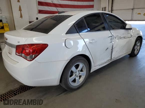 2015 Chevrolet Cruze LT z VIN 1G1PC5SB1F7130928, wystawiony jako Copart lot #84561045 z przebiegiem 106 370 mil mil oraz Szkoda całkowita • Salvage title. Historia ofert i sprzedaży dostępna na DreamBid. Obrazek 3.