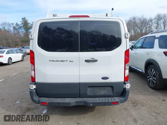 ✅ 2015 Ford Transit Cargo • VIN: 1FTNE1ZM1FKA69893 • Лот: 41330596. Опубликован ранее на IAAI с пробегом 234 974 миль. Бесплатный доступ к архиву аукционных продаж из США и подробный отчёт об истории автомобиля на DreamBid. Изображение 17.