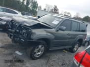 ✅ 2001 Toyota Land Cruiser • VIN: JTEHT05J012004269 • Лот: 41037545. Опубликован ранее на IAAI с пробегом 180 814 миль. Бесплатный доступ к архиву аукционных продаж из США и подробный отчёт об истории автомобиля на DreamBid. Изображение 14.