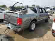2005 Dodge Dakota SLT с VIN 1D7HE48N05S314132, выставлен на аукционе Copart как лот 62153634 с пробегом 177 064 миль миль и Списание • Salvage title. История ставок и продаж доступна на DreamBid. Изображение 3.