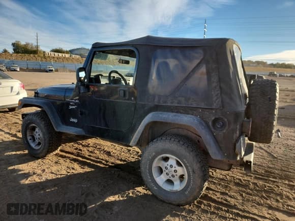 ✅ 2000 Jeep Wrangler Sport • VIN: 1J4FA49S9YP738234 • Lot: 91114555. Listed on Copart with 245,066 mi. Free auction sales archive from the USA and detailed vehicle history report at DreamBid. Image 2.