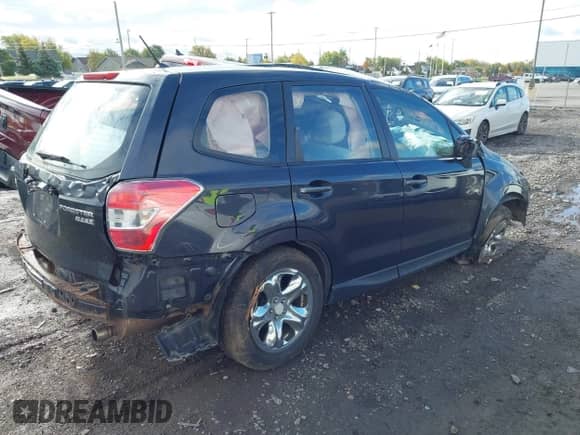 2014 Subaru Forester 2.5i with VIN JF2SJAACXEH413526, listed as a IAAI auction lot 43518240 with 173,866 mi miles and . Bid and sale history available at DreamBid. Image 4.