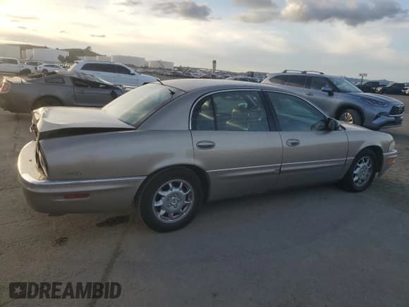✅ 2001 Buick Park Avenue Ultra • VIN: 1G4CU541914233642 • Lot: 47546405. Listed on Copart with 111,565 mi. Free auction sales archive from the USA and detailed vehicle history report at DreamBid. Image 3.