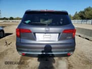 ✅ 2018 Honda Pilot Touring • VIN: 5FNYF6H91JB005668 • Лот: 85587675. Опубликован ранее на Copart с пробегом 104 956 миль. Бесплатный доступ к архиву аукционных продаж из США и подробный отчёт об истории автомобиля на DreamBid. Изображение 6.