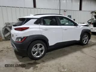 ✅ 2023 Hyundai Kona SEL • VIN: KM8K3CAB6PU987414 • Лот: 76350294. Опубликован ранее на Copart с пробегом 16 511 миль. Бесплатный доступ к архиву аукционных продаж из США и подробный отчёт об истории автомобиля на DreamBid. Изображение 3.