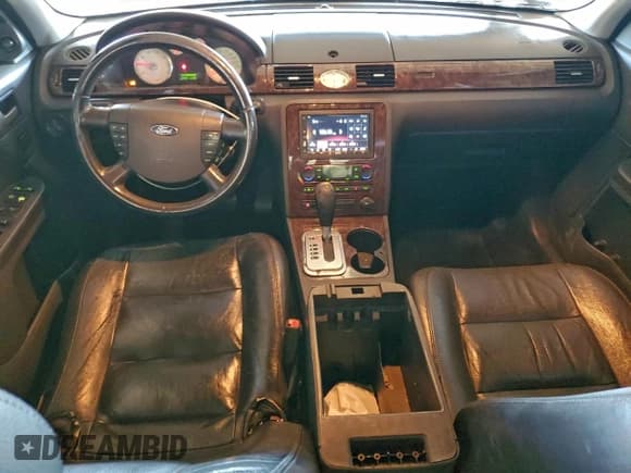 ✅ 2006 Ford Five Hundred Limited • VIN: 1FAFP25126G130449 • Лот: 95969935. Опубликован ранее на Copart с пробегом Не указан. Бесплатный доступ к архиву аукционных продаж из США и подробный отчёт об истории автомобиля на DreamBid. Изображение 8.