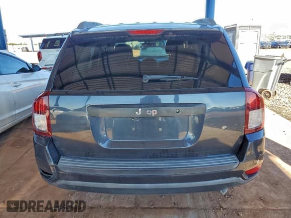 ✅ 2014 Jeep Compass Sport • VIN: 1C4NJCBAXED725910 • Lot: 93786035. Listed on Copart with 107,972 mi. Free auction sales archive from the USA and detailed vehicle history report at DreamBid. Image 6.