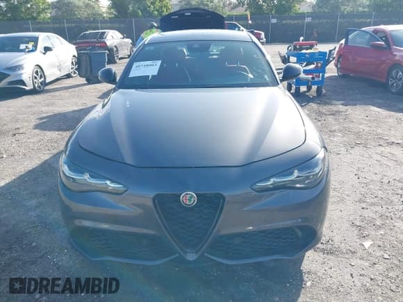 ✅ 2024 Alfa Romeo Giulia Veloce • VIN: ZARFAMBN5R7677885 • Лот: 40748003. Опубликован ранее на IAAI с пробегом 2 214 миль. Бесплатный доступ к архиву аукционных продаж из США и подробный отчёт об истории автомобиля на DreamBid. Изображение 6.