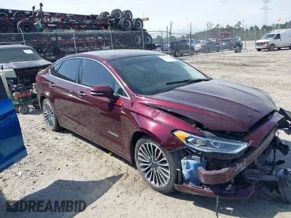 ✅ 2017 Ford Fusion Hybrid Titanium • VIN: 3FA6P0RU0HR267622 • Lot: 41834886. Listed on IAAI with 139,222 mi. Free auction sales archive from the USA and detailed vehicle history report at DreamBid. Image 13.