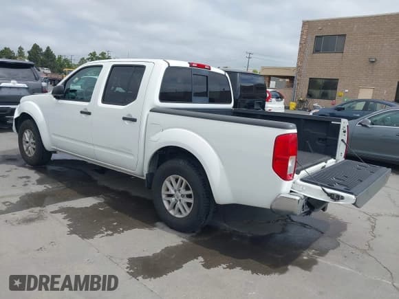 ✅ 2016 Nissan Frontier SV • VIN: 1N6AD0ER7GN737013 • Lot: 42106586. Listed on IAAI with 54,218 mi. Free auction sales archive from the USA and detailed vehicle history report at DreamBid. Image 3.