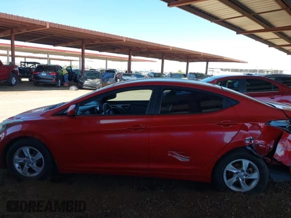✅ 2015 Hyundai Elantra SE • VIN: KMHDH4AE2FU458891 • Lot: 42821027. Listed on IAAI with 127,669 mi. Free auction sales archive from the USA and detailed vehicle history report at DreamBid. Image 14.