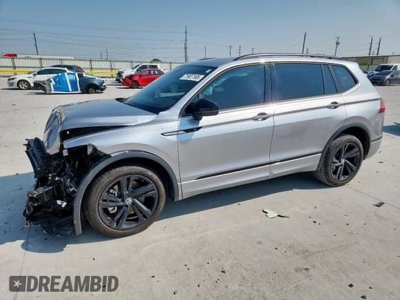 ✅ 2024 Volkswagen Tiguan SE R-Line Black • VIN: 3VVCB7AX7RM054192 • Лот: 71907165. Опубликован ранее на Copart с пробегом 20 299 миль. Бесплатный доступ к архиву аукционных продаж из США и подробный отчёт об истории автомобиля на DreamBid. Изображение 1.