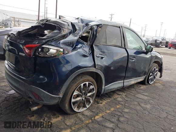 ✅ 2016 Mazda CX-5 Grand Touring • VIN: JM3KE2DY8G0885958 • Lot: 43369411. Wystawiony na IAAI z przebiegiem 171 093 mil. Bezpłatny archiwum sprzedaży aukcyjnych z USA i szczegółowy raport historii pojazdu na DreamBid. Zdjęcie 4.