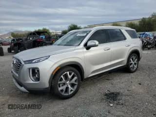 2021 Hyundai Palisade SEL с VIN KM8R44HE2MU252636, выставлен на аукционе Copart как лот 82469985 с пробегом 54 154 миль миль и Списание • Salvage title. История ставок и продаж доступна на DreamBid. Изображение 1.