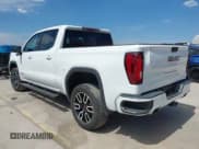 ✅ 2021 GMC Sierra 1500 AT4 • VIN: 3GTP9EELXMG360365 • Лот: 43158114. Опубликован ранее на IAAI с пробегом 62 924 миль. Бесплатный доступ к архиву аукционных продаж из США и подробный отчёт об истории автомобиля на DreamBid. Изображение 3.