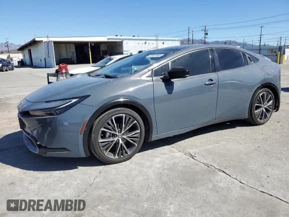 ✅ 2024 Toyota Prius XLE • VIN: JTDACAAU9R3015224 • Лот: 87007985. Опубликован ранее на Copart с пробегом 34 679 миль. Бесплатный доступ к архиву аукционных продаж из США и подробный отчёт об истории автомобиля на DreamBid. Изображение 1.