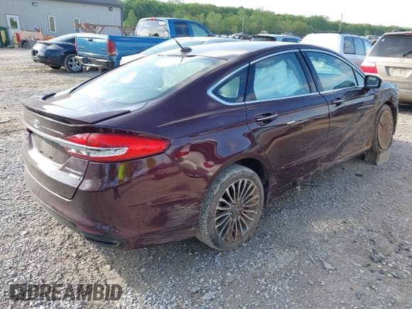 ✅ 2017 Ford Fusion Titanium • VIN: 3FA6P0D90HR231500 • Lot: 42220802. Listed on IAAI with 104,041 mi. Free auction sales archive from the USA and detailed vehicle history report at DreamBid. Image 4.