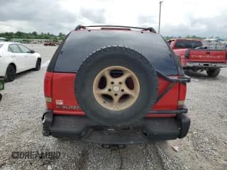 ✅ 1999 Chevrolet Blazer LS • VIN: 1GNCT18W3XK150385 • Lot: 58490985. Wystawiony na Copart z przebiegiem 262 007 mil. Bezpłatny archiwum sprzedaży aukcyjnych z USA i szczegółowy raport historii pojazdu na DreamBid. Zdjęcie 6.