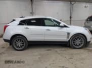 ✅ 2014 Cadillac SRX Performance Collection • VIN: 3GYFNFE36ES654593 • Lot: 43702163. Wystawiony na IAAI z przebiegiem 90 611 mil. Bezpłatny archiwum sprzedaży aukcyjnych z USA i szczegółowy raport historii pojazdu na DreamBid. Zdjęcie 14.