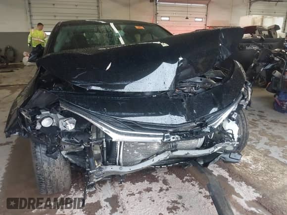 2022 Chevrolet Malibu LT z VIN 1G1ZD5STXNF124161, wystawiony jako IAAI lot #43594417 z przebiegiem 110 894 mil mil oraz . Historia ofert i sprzedaży dostępna na DreamBid. Obrazek 6.