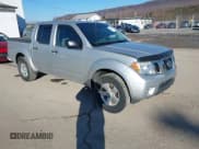 ✅ 2013 Nissan Frontier SL • VIN: 1N6AD0EV0DN731594 • Lot: 41702767. Listed on IAAI with 101,611 mi. Free auction sales archive from the USA and detailed vehicle history report at DreamBid. Image 1.