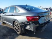 ✅ 2023 Volkswagen Jetta Sport • VIN: 3VWAM7BU3PM013069 • Lot: 41355296. Listed on IAAI with 21,168 mi. Free auction sales archive from the USA and detailed vehicle history report at DreamBid. Image 3.