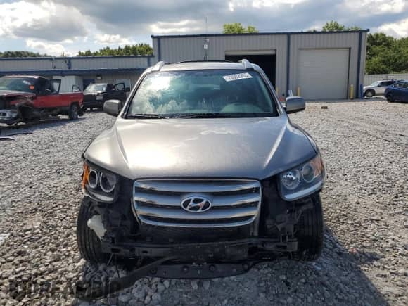 ✅ 2012 Hyundai Santa Fe SE • VIN: 5XYZHDAG1CG110640 • Lot: 70302985. Listed on Copart with 187,049 mi miles. Access the free auction sales archive from the USA and view a detailed vehicle history report at DreamBid. Image 5.