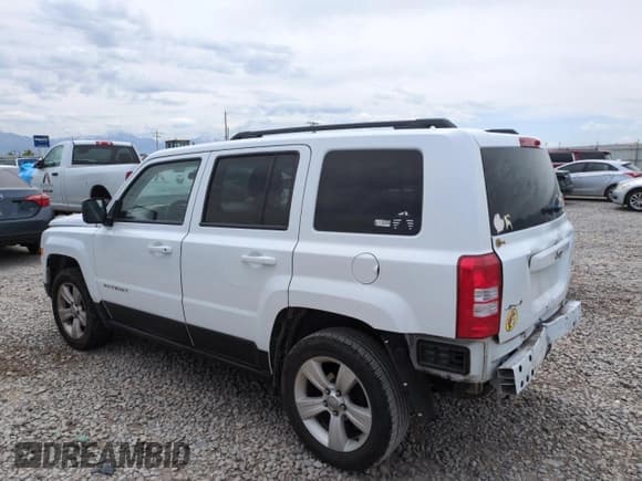 ✅ 2014 Jeep Patriot Latitude • VIN: 1C4NJRFB0ED760056 • Lot: 58931465. Listed on Copart with 192,469 mi. Free auction sales archive from the USA and detailed vehicle history report at DreamBid. Image 2.