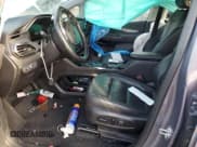 ✅ 2023 Chevrolet Bolt EV 2LT • VIN: 1G1FX6S07P4162354 • Lot: 44518585. Wystawiony na Copart z przebiegiem 24 769 mil. Bezpłatny archiwum sprzedaży aukcyjnych z USA i szczegółowy raport historii pojazdu na DreamBid. Zdjęcie 7.