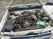 ✅ 1999 Toyota Tacoma • VIN: 4TAVL52N0XZ570861 • Lot: 80557875. Listed on Copart with 274,648 mi. Free auction sales archive from the USA and detailed vehicle history report at DreamBid. Image 11.