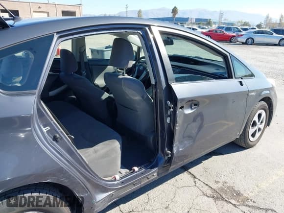 ✅ 2014 Toyota Prius Four • VIN: JTDKN3DU7E1779102 • Лот: 43562096. Опубликован ранее на IAAI с пробегом 98 799 миль. Бесплатный доступ к архиву аукционных продаж из США и подробный отчёт об истории автомобиля на DreamBid. Изображение 6.