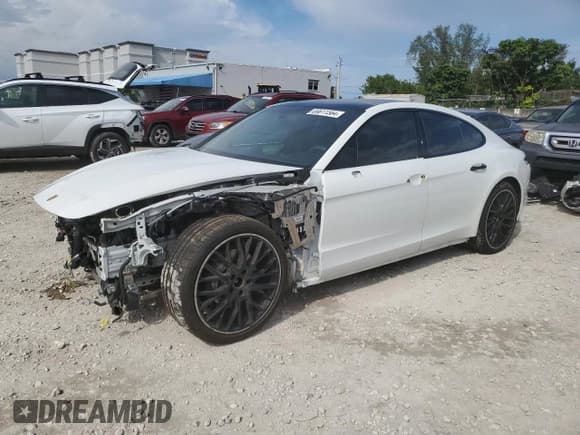 ✅ 2021 Porsche Panamera • VIN: WP0AJ2A72ML112876 • Лот: 69811564. Опубликован ранее на Copart с пробегом 24 727 миль. Бесплатный доступ к архиву аукционных продаж из США и подробный отчёт об истории автомобиля на DreamBid. Изображение 1.