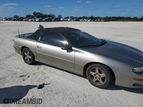 ✅ 2002 Chevrolet Camaro • VIN: 2G1FP32K922121268 • Lot: 81370464. Listed on Copart with Not provided. Free auction sales archive from the USA and detailed vehicle history report at DreamBid. Image 4.